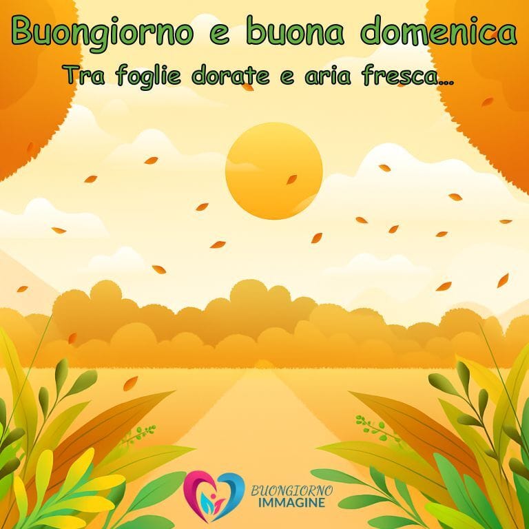 Un'illustrazione colorata di un paesaggio autunnale con un sole giallo, foglie dorate che cadono, cielo chiaro con nuvole, e vegetazione verde ai lati, con il testo "Buongiorno e buona domenica" e "Tra foglie dorate e aria fresca..." in verde.