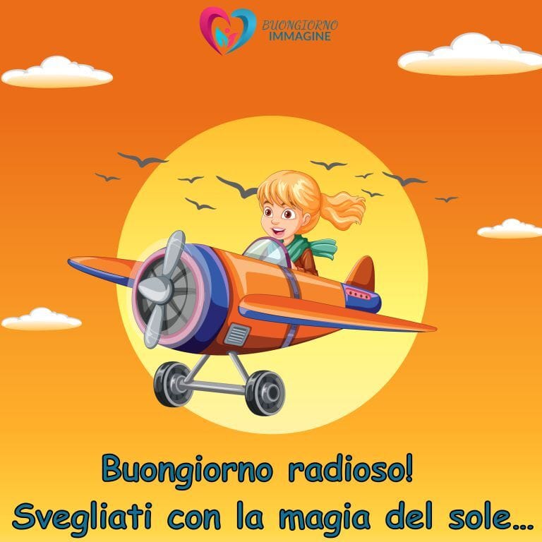Un'illustrazione colorata di un paesaggio autunnale con un sole giallo, foglie dorate che cadono, cielo chiaro con nuvole, e vegetazione verde ai lati, con il testo "Buongiorno e buona domenica" e "Tra foglie dorate e aria fresca..." in verde.