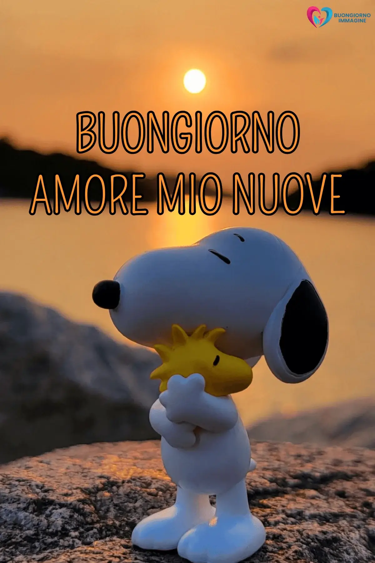 Immagini buongiorno Snoopy con cuore rosso