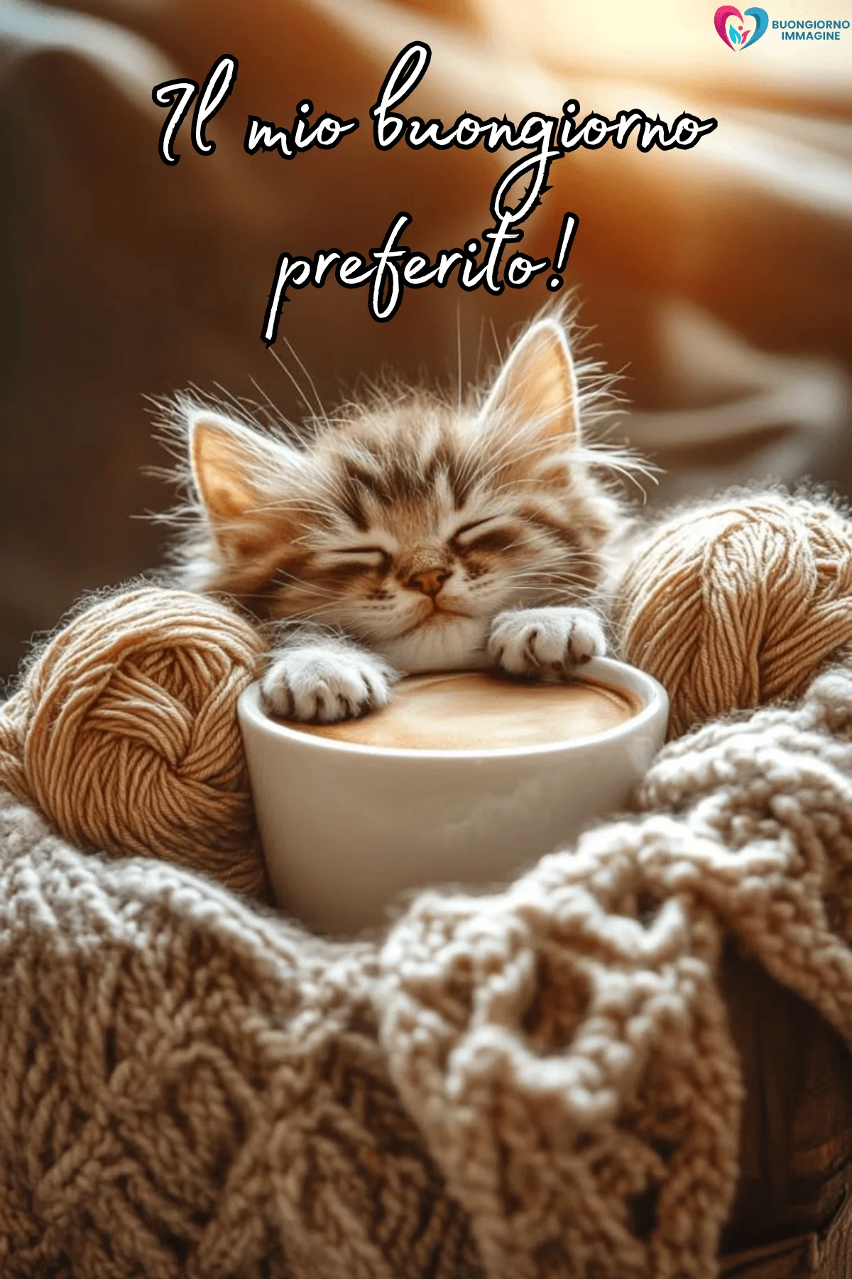 Immagini buongiorno con gattino tra gomitoli