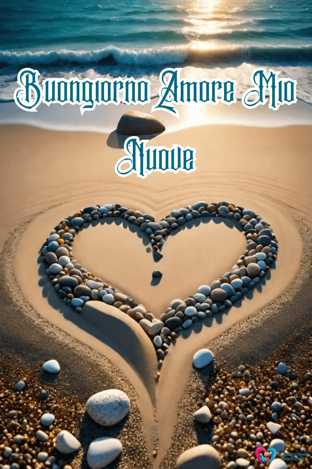 Immagini buongiorno con cuore di sassi in riva