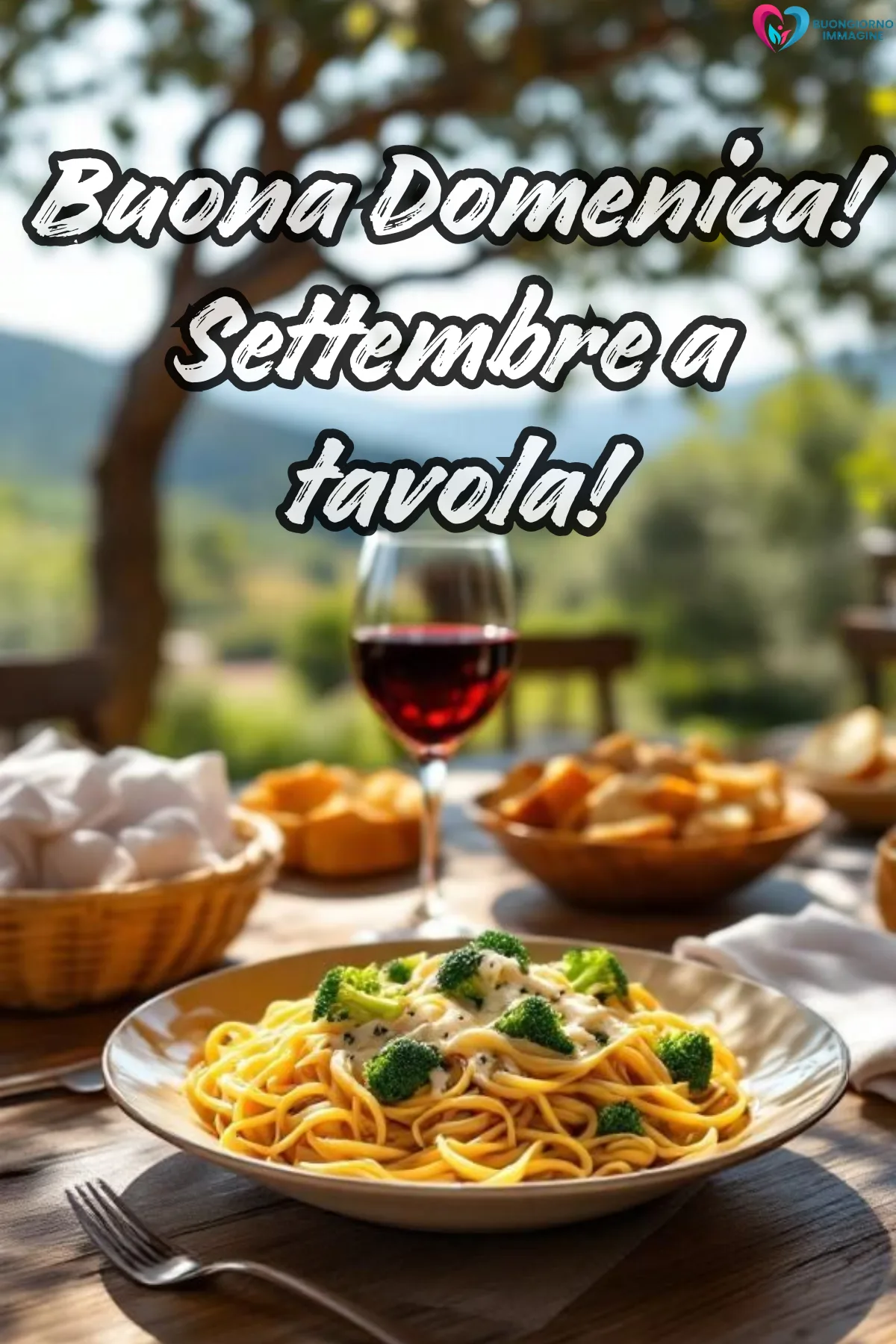 pasta con broccoli vino rosso tavola all'aperto paesaggio - buongiornoimmagine.it - settembre 2026