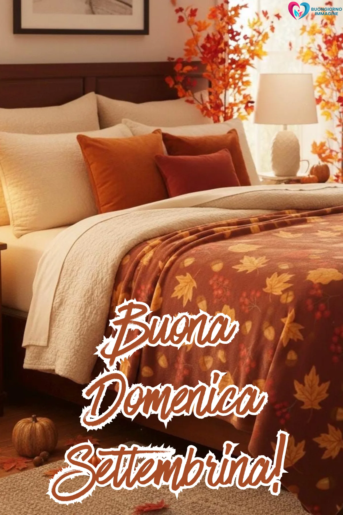 immagini buongiorno settembre - camera accogliente autunnale con coperta foglie e zucche - immagini nuove gratis per WhatsApp