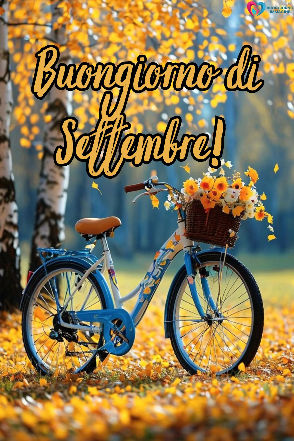 bicicletta blu con fiori tra foglie autunnali dorate - buongiornoimmagine.it - settembre 2026